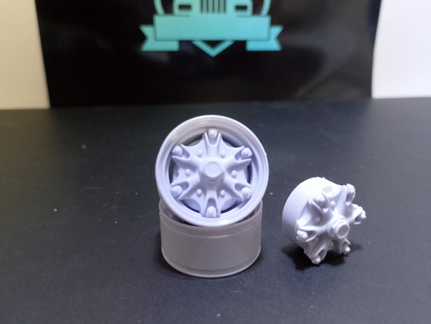 1 pair of 1/24 6 stud steer spider hubs and rims (Malco style)